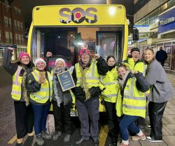 SOS Bus volunteers looking thrilled