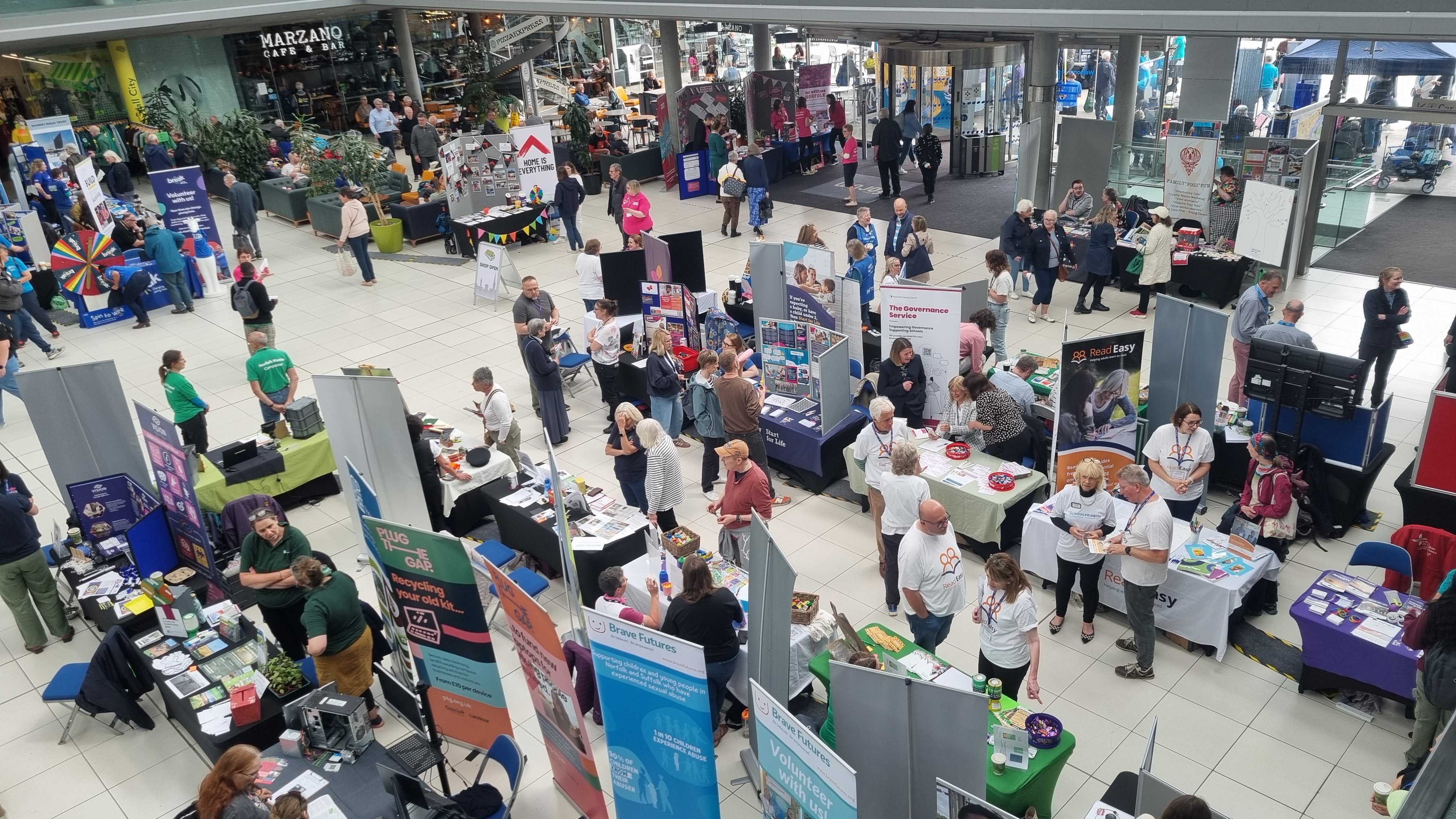 stalls with people from charities